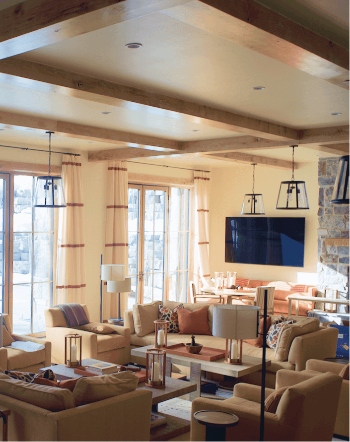 Exposed ceiling beams integrated into a custom interior