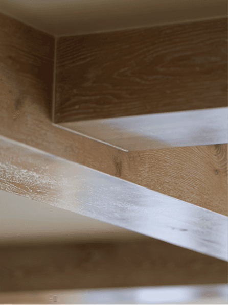 Architectural ceiling beam detail in a luxury residence