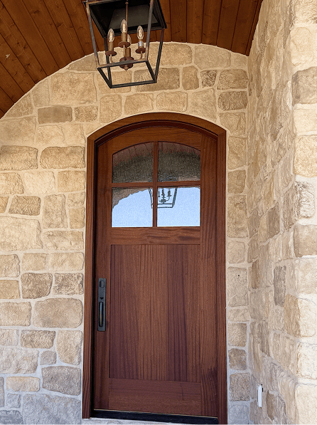 Interior wood door integrated into a refined modern space