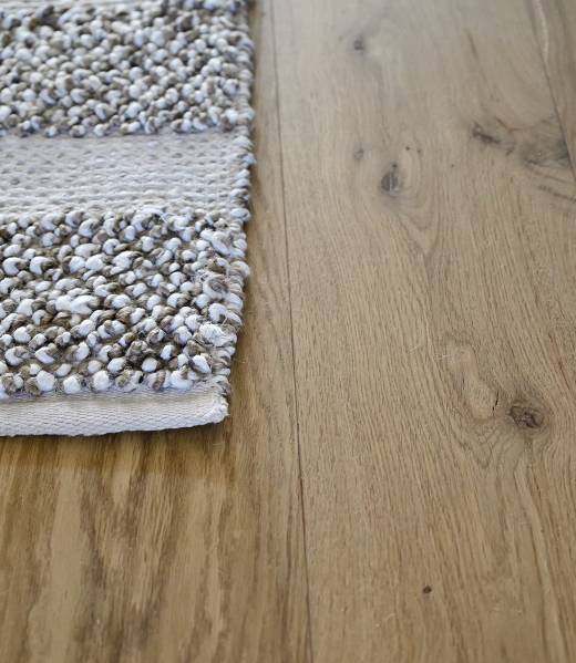 custom wood flooring with a rug